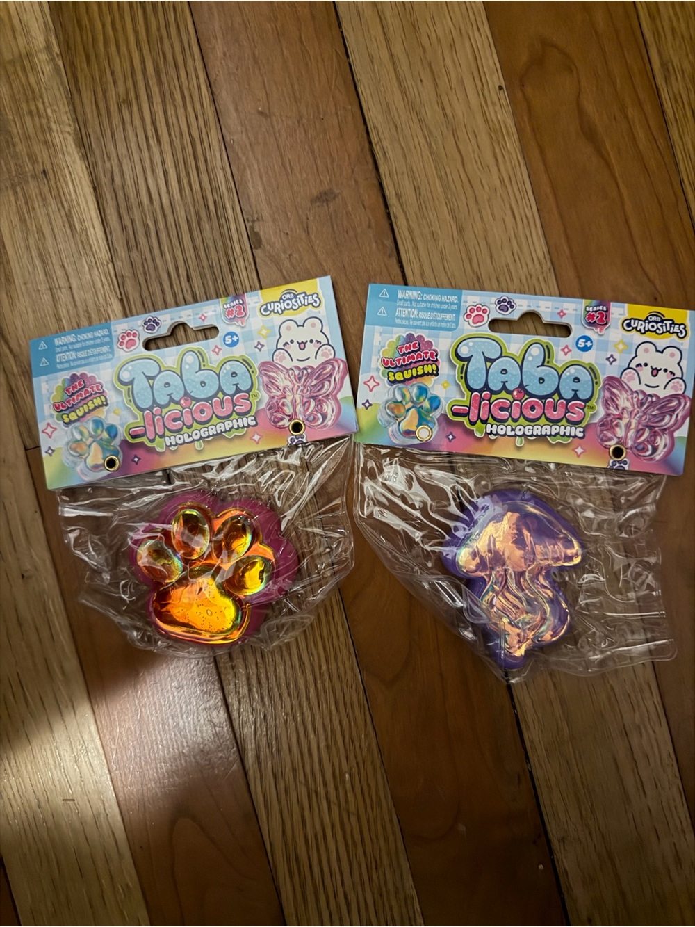 TABA NWT Holographic Squishy Toy - Purple/Gold